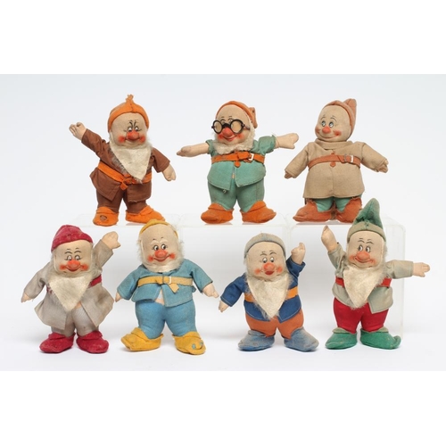 26 - A pre-war Chad Valley Snow White & the Seven Dwarfs, of felt and cloth construction, Doc with his or... 