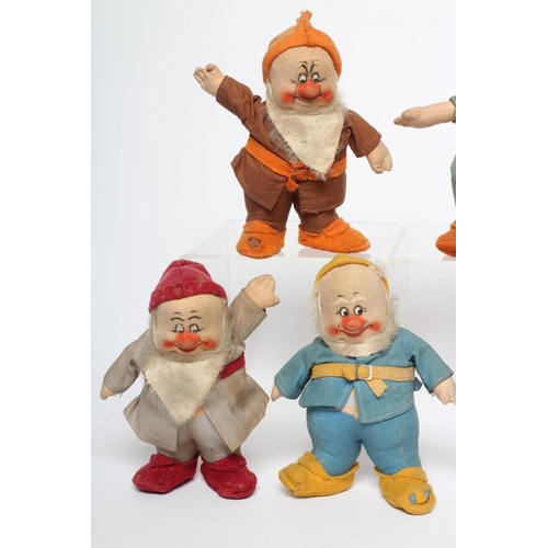 26 - A pre-war Chad Valley Snow White & the Seven Dwarfs, of felt and cloth construction, Doc with his or... 