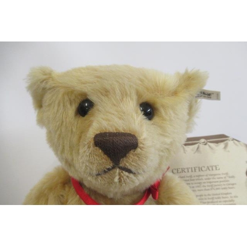 260 - A large Steiff 1907 replica teddy bear, with felt pads, button eyes, ear button and label, with cert... 