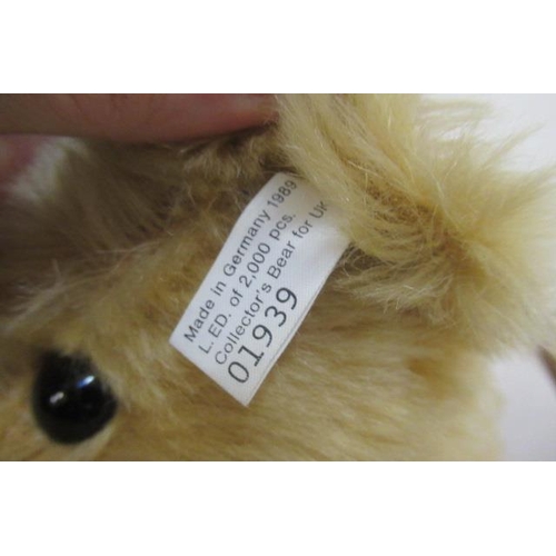 260 - A large Steiff 1907 replica teddy bear, with felt pads, button eyes, ear button and label, with cert... 