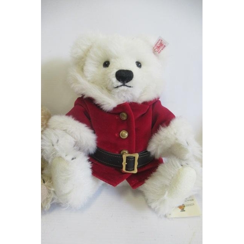 263 - Four Steiff bears, comprising a 26cm 2008 Christmas bear, a 26cm 1920 limited edition, a 25cm 110th ... 