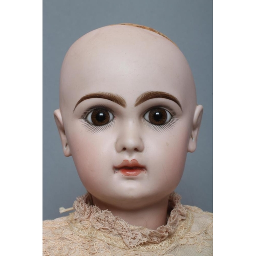 30 - A Tete Jumeau bisque socket head doll, with brown glass fixed eyes, closed mouth, pierced ears, brow... 