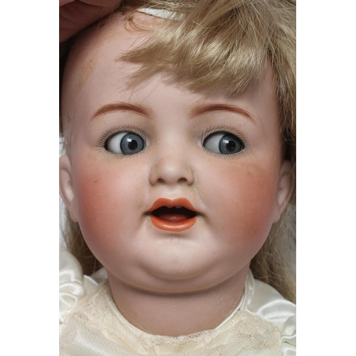 33 - A Kammer & Reinhardt bisque socket head flirty character doll, with blue glass flirty eyes, sleeping... 