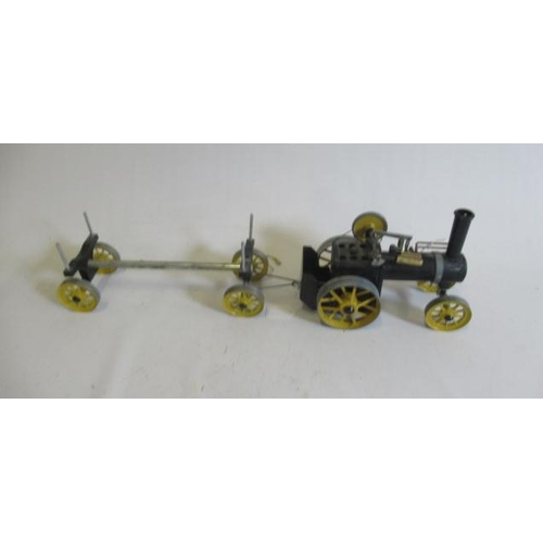 357 - A Mamod steam traction engine and log wagon finished in black and yellow, with burner, F-G (Est. plu... 