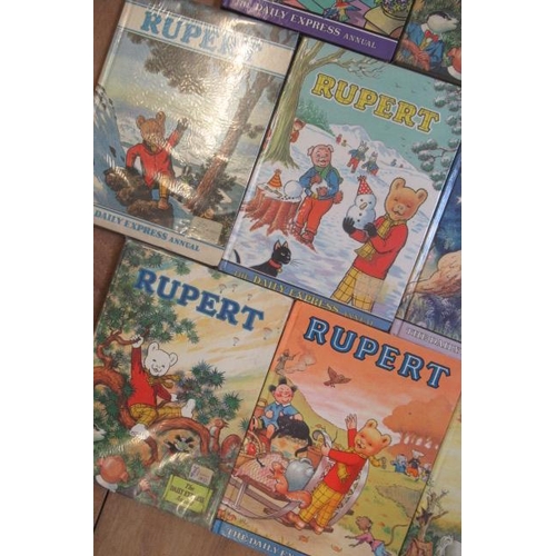 363 - Sixteen Daily Express Rupert Annuals from 1970, G  (Est. plus 17.5% premium)