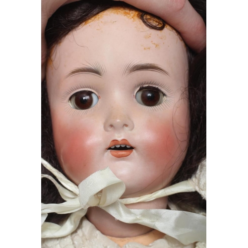 37 - A Hertel, Schwab & Co. bisque socket head doll, with brown glass sleeping eyes, open mouth, applied ... 