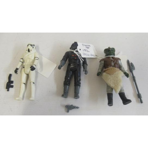 405 - Unboxed 1980's Star Wars figures comprising Storm Trooper with weapon, Fighter Pilot with hand gun a... 