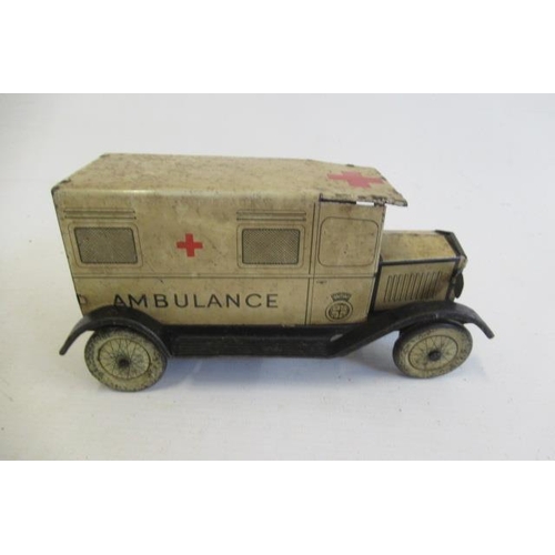 436 - Wells tinplate ambulance, some rusting/paint loss, clock motor AF, F-P (Est. plus 21% premium inc. V... 