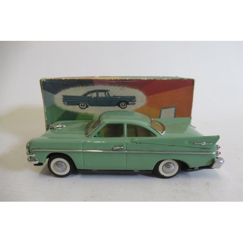 438 - A battery operated automatic streamline electric Sedan, battery box has rusting on inside, car body ... 