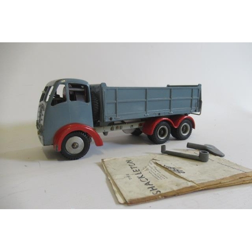 503 - Shackleton clockwork Foden tipper lorry finished in pale blue/red, some minor paint chips, no fatigu... 