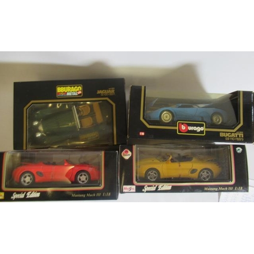 537 - Burago Bugatti EB110, Jaguar SS100, two Masito Mustangs Mach III, boxed, E (Est. plus 21% premium in... 