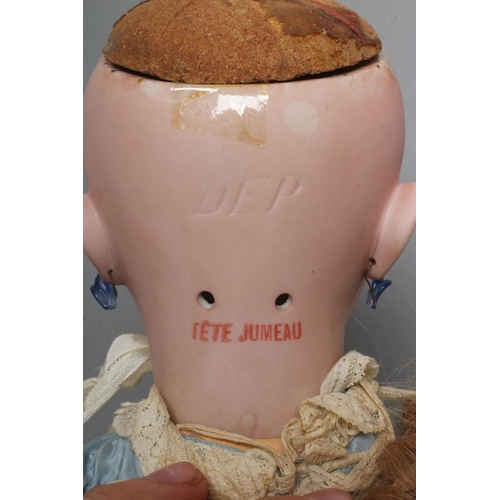 54 - A Tete Jumeau bisque socket head doll, with blue glass sleeping eyes, open mouth, moulded teeth, pie... 