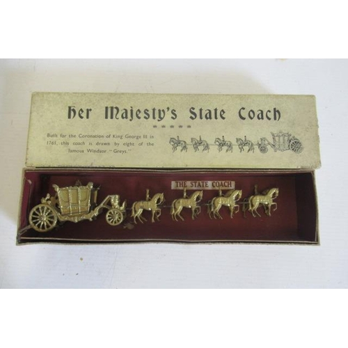 546 - Small coronation coach finished in gold, boxed E (Est. plus 21% premium inc. VAT)