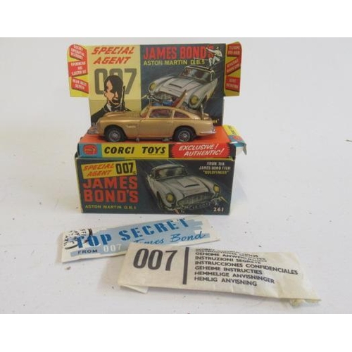 580 - Corgi 261 James Bond's Aston Martin DB5, boxed with instruction sheet and spare passenger, box E, mo... 