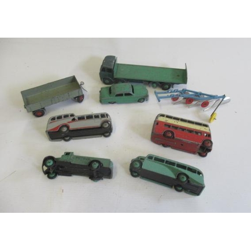 609 - Unboxed Dinky vehicles including Foden Flat Bed, three buses and tanker truck, F-P (Est. plus 21% pr... 