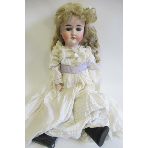 63 - A Gebruder Knoch bisque socket head doll, with blue glass sleeping eyes, open mouth, teeth, pierced ... 