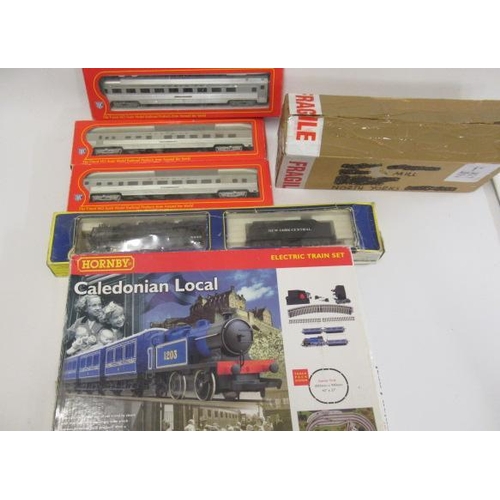 642 - HO Scale A.H.M. Hudson locomotive and three Santa-Fe coaches, and a Hornby Caledonian 0-4-0 train se... 