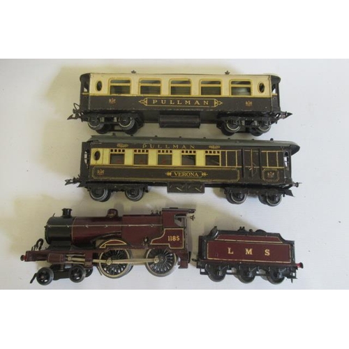 741 - Clockwork Hornby L.M.S. Compound and two Hornby Pullman coaches, minor paint loss to locomotive, som... 