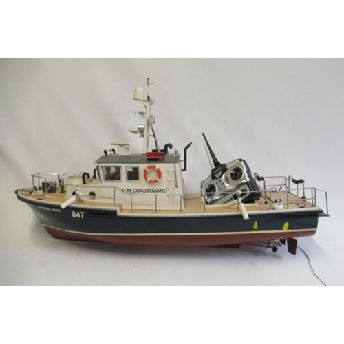 754 - A radio controlled model of H.M. Coast Guard Launch, one hatch missing, fitted with R.C. equipment, ... 