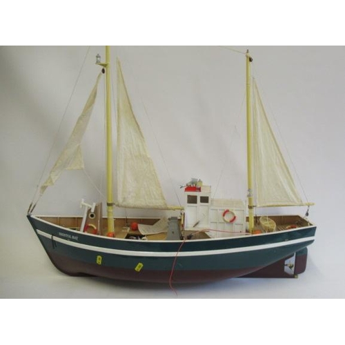 756 - A radio controlled fishing boat Bristol Bay with fitted electric motor and sails, 80cm x 20cm x 80cm... 