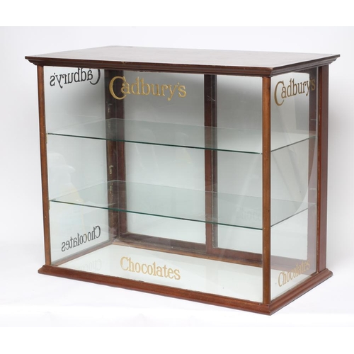 783 - A fine quality Cadbury's Chocolate Shop display cabinet, wood frame with glass infill sliding door a... 