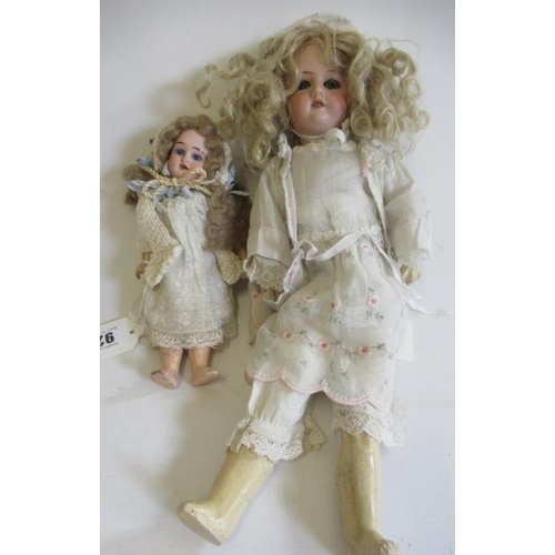 92 - Two Armand Marseille bisque socket head dolls, comprising one with blue glass fixed eyes, open mouth... 