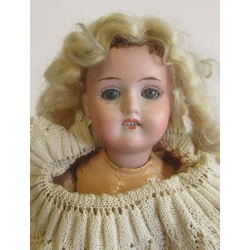 94 - A William Goebel bisque socket head doll, with blue glass sleeping eyes, open mouth, teeth, blond wi... 