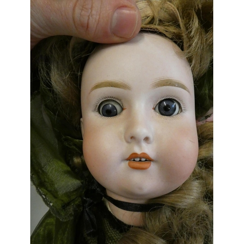 45 - An Adolf Wislizenus bisque socket head doll, with blue glass sleeping eyes, open mouth, teeth, blond... 