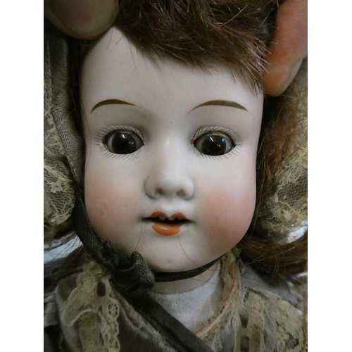 56 - Two Armand Marseille bisque socket head dolls, 390 mold, with brown glass sleeping eyes, open  mouth... 