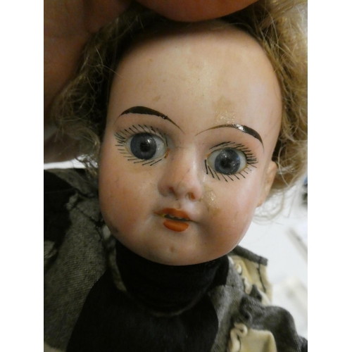 58 - Two Armand Marseille bisque shoulder head dolls, comprising one 3200 with brown glass fixed eyes, op... 