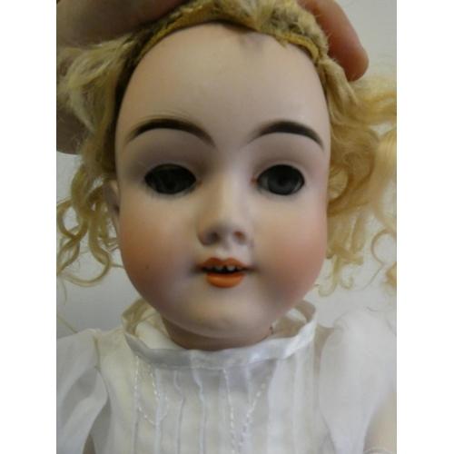 66 - A Max Handwerck bisque socket head doll, with blue glass sleeping eyes, open mouth, teeth, blond wig... 