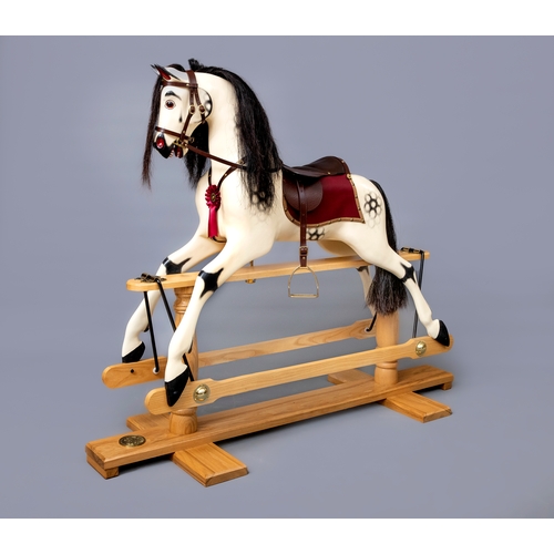 305 - A beautifully made Rocking Horse Shop rocking horse, of carved wood form, head turning, mouth open, ... 