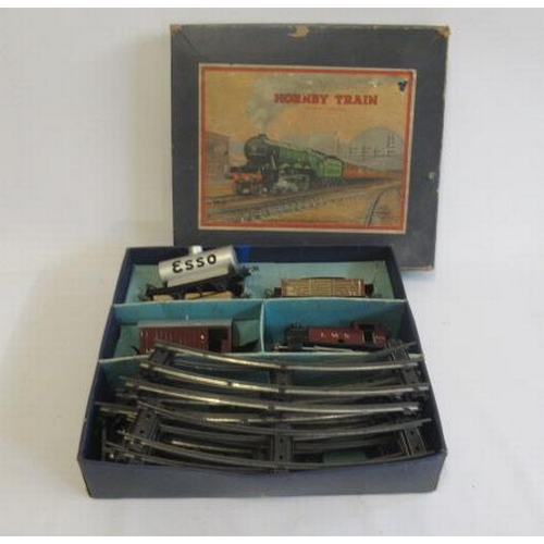 734 - Hornby Post War clockwork train set with 101 LMS tank engine and goods wagons, F-G (Est. plus 21% pr... 