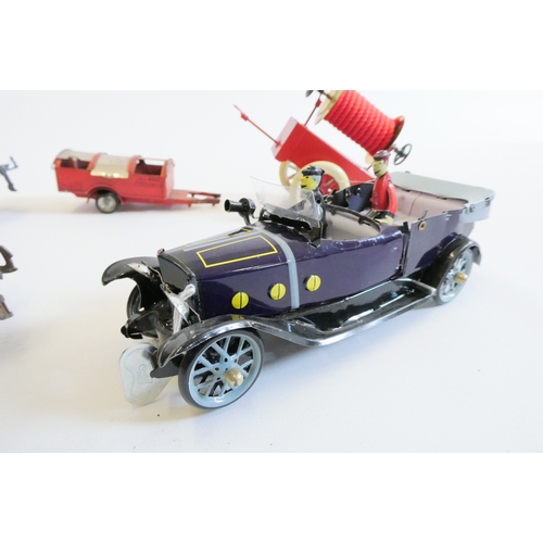 428 - Playworn unboxed tinplate toys including town car, fire hose trailer, two wagons and Minic trailer, ... 