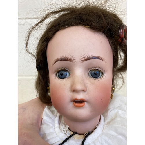 62 - An Alt Beck & Gottschalck bisque socket head doll, with blue glass sleeping eyes, open mouth, applie... 