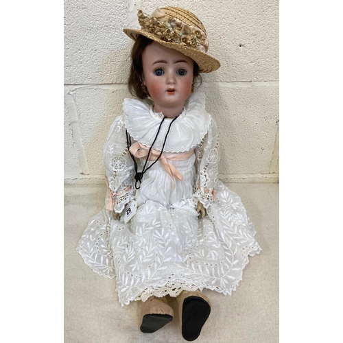 62 - An Alt Beck & Gottschalck bisque socket head doll, with blue glass sleeping eyes, open mouth, applie... 