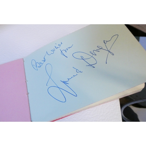 283 - A large collection of autographs, including signed photographs, autograph books and programmes, incl... 