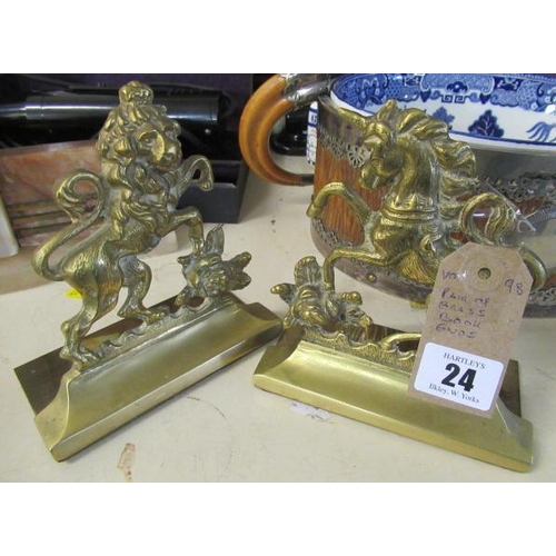 24 - PAIR OF CAST BRASS BOOK ENDS