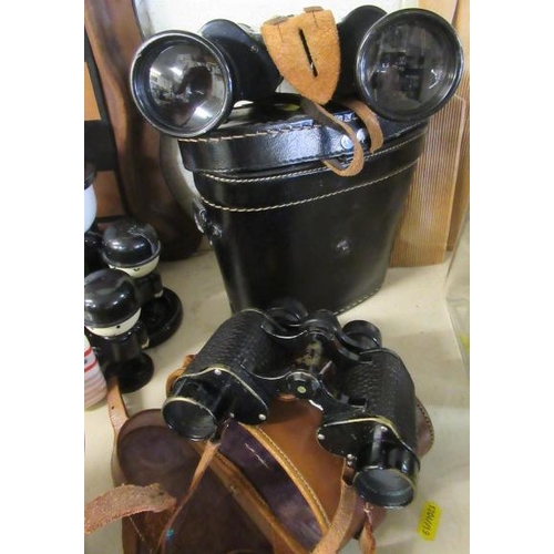 27 - TWO PAIRS OF CASED BINOCULARS