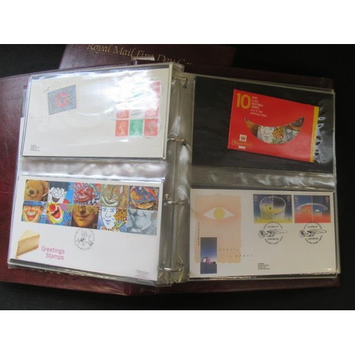 576 - TWO ALBUMS OF ROYAL MAIL FIRST DAY COVERS