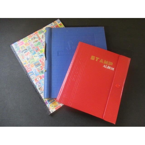 588 - THREE ALBUMS OF MINT AND USED STAMPS INCLUDING CHINESE EXAMPLES