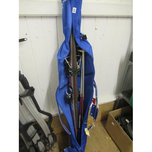 529 - PAIR OF CASED SKIS