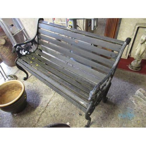 561 - GARDEN BENCH WITH CAST IRON ENDS