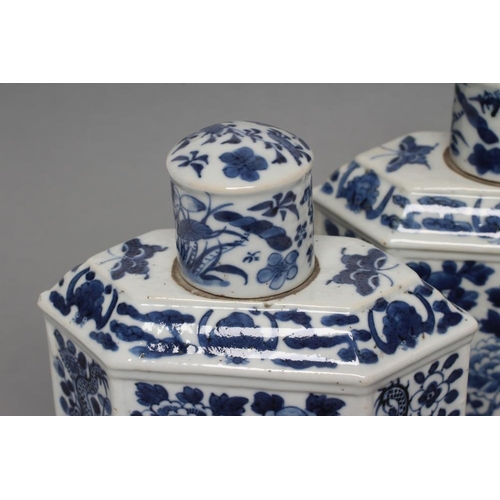 10 - A PAIR OF CHINESE PORCELAIN CANISTERS AND COVERS of canted oblong form, painted in underglaze blue w... 