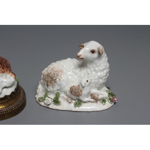 23 - A MEISSEN PORCELAIN GROUP, early 19th century, modelled as two recumbent sheep on a flower encrusted... 