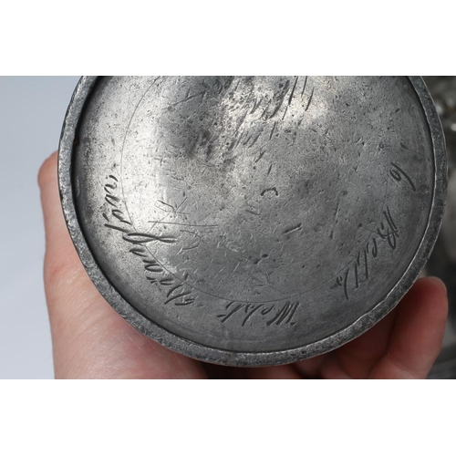 284 - A NORMANDY(?) PEWTER FLAGON, 19th century, the heart shaped lid stamped 