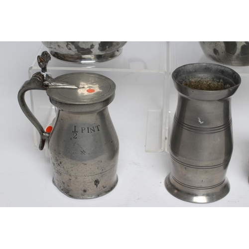 285 - A COLLECTION OF PEWTER including a baluster half pint measure, 18th century, the flat lid with doubl... 