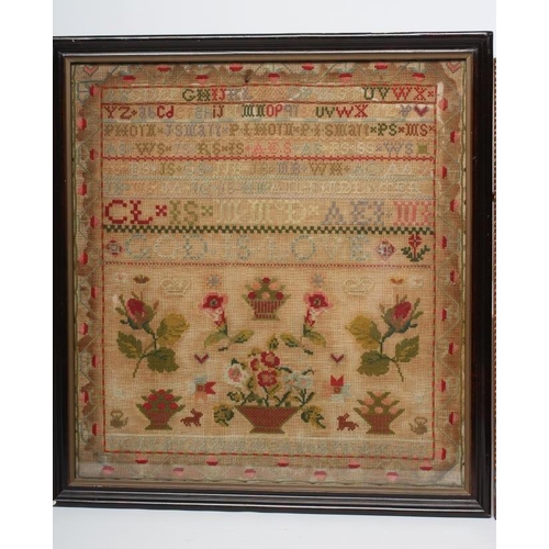 330 - A WILLIAM IV SAMPLER, 1834, worked in coloured wools in full cross stitch on a coarse linen ground w... 