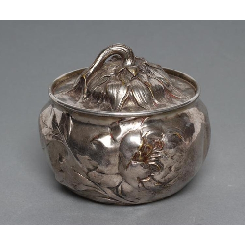 336 - AFTER EUGENE LELIEVRE (1856-1945) An art nouveau silvered bronze box and cover, of lobed squat form,... 