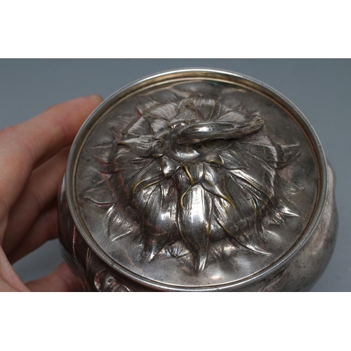 336 - AFTER EUGENE LELIEVRE (1856-1945) An art nouveau silvered bronze box and cover, of lobed squat form,... 